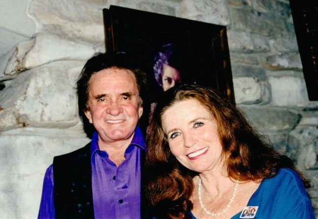 How much older was discount june carter to johnny cash